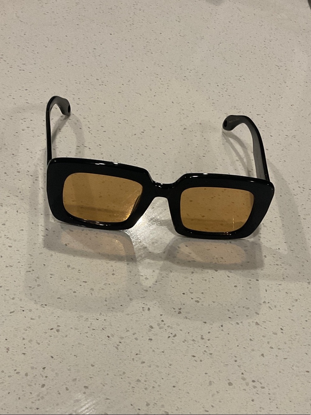 Elisa Johnson- Maya - Black Frame Sunglasses with Amber Lenses